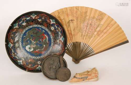 A 19th Century Chinese silk child's shoe with gold thread details, two similar circular bronze mirrors, one of racquets shape, with a circular cloisonne plate, diameter 30cm and a paper fan, S/D. (5)  BR 1999/68 BR 1999/25 (2) BR 1943/24 BR 199/131