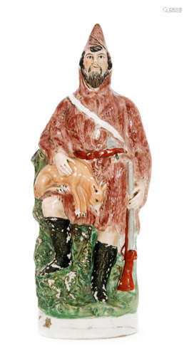 A 19th Century Staffordshire figure modelled as Robinson Crusoe stood in a brown hooded coat with a deer on his knee and his gun by his side, unmarked, height 34cm