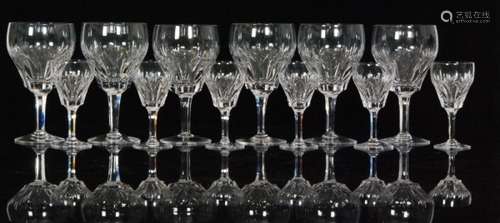 A set of six 20th Century Stuart Crystal Cardinal pattern wine glasses with heavy basal cutting, together with a set of six sherry glasses in the conforming pattern, tallest 17cm. (12)