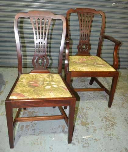 Five early 20th Century Chippendale style mahogany dining chairs each with a pieced vase splat on square tapering legs and castors together with a matching elbow chair (6)