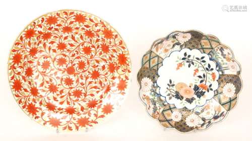 A late 19th Century Continental shallow bowl decorated in the Worcester style with Chinoiserie flowers against a patterned ground, bears faux anchor mark, probably Samson, diameter 20.5cm, A/F, together with a 19th Century shallow bowl decorated with burnt orange flower heads with gilt leaves, in the Persian style, unmarked, diameter 24cm (2)