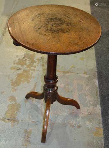 A 19th Century oak circular occasional table on turned pedestal on splayed tripod legs, diameter 46cm