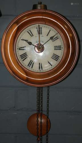 A late 19th Century and later converted postman's alarm clock, the dial named Lee's below a bell, width 24cm