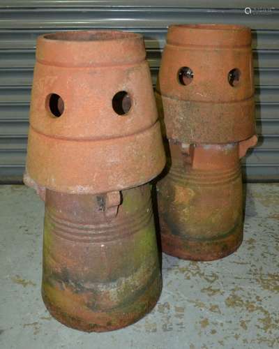 A pair of terracotta conical shaped chimney pots, height 72cm (2)