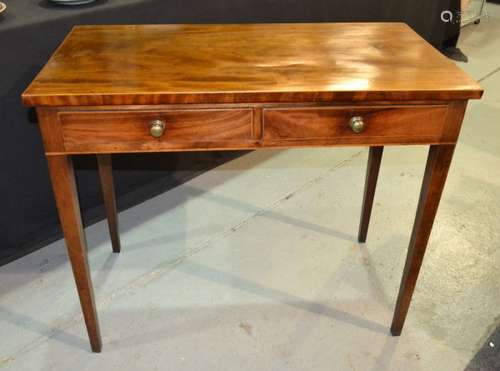 A 19th Century mahogany side table, fitted with two frieze drawers above square tapered legs, width 95cm.