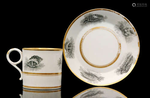 An early 19th Century Flight Barr and Barr coffee cup with loop handle and saucer, each decorated with a bat printed border of shells within gilt bands, impressed FBB mark, height 6cm