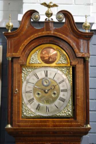 An oak and mahogany longcase clock with various alterations, with silvered chapter ring bearing signature for Thomas Deykin, Worcester and date aperature and subsidiary dial and eight day striking movement enclosed by a broken swan neck hood centred by an eagle finial above a trunk door inlaid with shell paterae over a canted plinth base, height 232cm