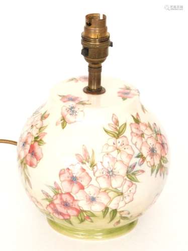 A Moorcroft Pottery ovoid lamp base decorated in the Spring Blossom pattern designed by Sally Tuffin, impressed marks, height 18cm (excluding fittings)