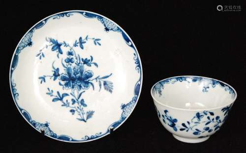 A late 18th Century Worcester blue and white tea bowl and saucer decorated in the Mansfield pattern, both pieces unmarked other than painters marks, saucer bears Mark Hall Col. 40 paper label. (2)