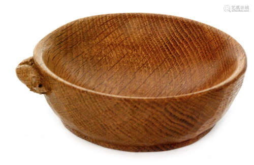 A Robert 'Mouseman' Thompson oak bowl of circular form, with a carved 'mouse' signature, diameter 14.5cm