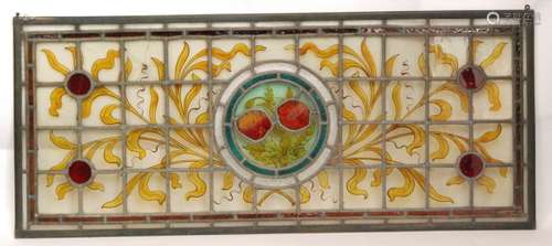 A  large stained glass panel of rectangular form central floral panel surrounded by gridded caming with scrolling floral decoration, unmarked, height 110cm.