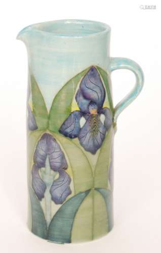 A Dennis China Works jug decorated in the Iris on blue pattern designed by Sally Tuffin, printed and painted marks, height 24cm