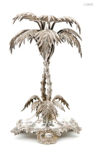 A Victorian silver plated table centre piece realistically modelled as two entwined palm trees on a shaped base with chased and scroll decoration, height 25cm