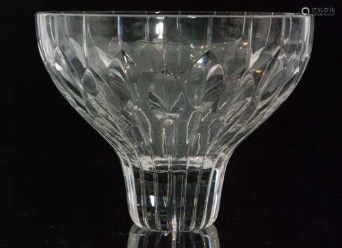 A large post war Stuart & Sons crystal glass bowl designed by John Luxton, the slender foot rising to a flared bowl cut with  a band of stylised leaves, acid marked, height 19cm.