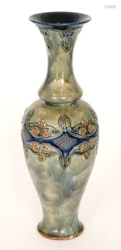 An early 20th Century Royal Doulton vase decorated with a central tubelined band of stylised flowers and foliage with blue diamond shapes, all to a mottled green ground, impressed marks with artist initials for Emily J Partington, height 42cm