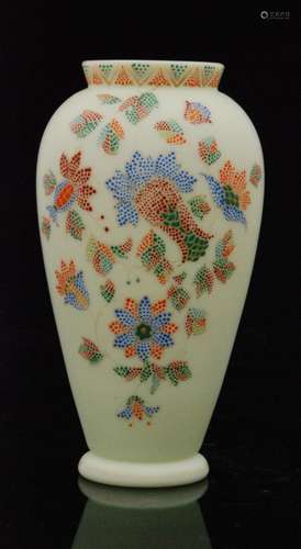 A late 19th Century Harrach glass vase of footed shouldered form with a short collar neck decorated with dotted enamelling of stylised flowers over the opal ground, unmarked, height 18cm.