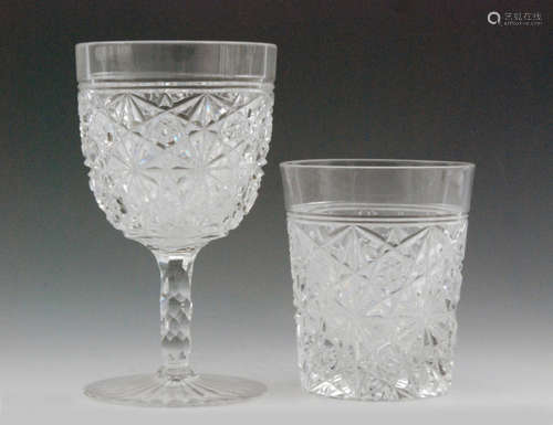 A part suite of early 20th Century Thomas Webb & Sons glass comprising five wine glasses and six tumblers, all cut in the Russian pattern with repeat star motives, tallest 14.5cm. (11)