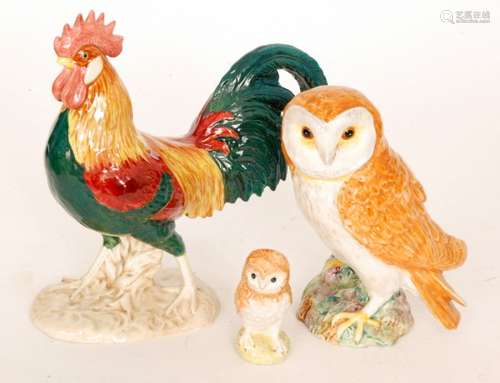 A Beswick Leghorn, model 1892, S/D, together with two Beswick owls to include models 1046 (3)