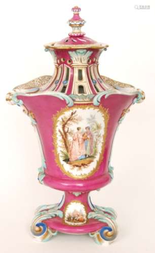 A large early 20th Century Dresden pot pourri pedestal vase and cover, the pink body with hand painted cartouche panels of Watteauesque courting couples, all within gilt frames, the neck with pierced sections and the foot with moulded scrolls, bears Augustus Rex mark, height 59cm, S/D