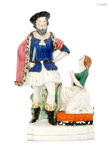 A 19th Century Staffordshire theatrical figure modelled as Mr Barton and Miss Rosa Henry playing Selim (or Giaffier) and Zuleika from 'The Bride of Abydos', he stood in a blue bodice and pink cape holding a knife, she kneeling before him, unmarked, height 33cm