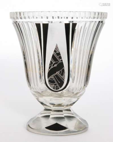 A 1930s Haida glass vase in the manner of Karel Palda of footed flared form decorated with black enamelled panels between vertical columns cuts, unmarked, height 21cm.