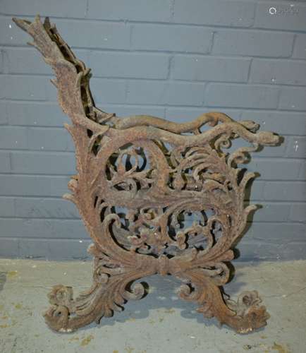 A pair of late 19th Century cast iron bench ends by the makers Archibald Kenrick & Sons West Bromwich of naturalistic pierced form and acanthus leaves below serpent arms, height 80cm (2)