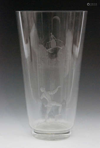 A post war Orrefors Romeo and Juliet clear crystal glass vase designed by Nils Landberg of footed flared form, decorated with Romeo with arms raised with Juliet atop a balcony opposing, engraved signature, height 19.5cm.