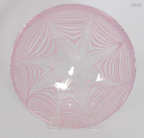 A post war Italian Murano glass bowl by Gino Cenedese, of shallow form internally decorated with pink pulled trails within the heavy clear crystal ground, diameter 30cm.