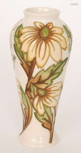 A Moorcroft Pottery Collectors Club vase decorated in the Rudbeckia pattern, printed and painted marks alongside M.C.C 97, height 21cm
