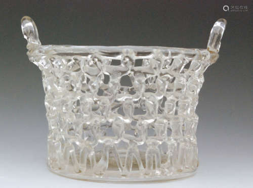 An 18th Century Liege a Traforato glass basket circa 1780, of flared form with two applied handles to the rim above the openwork body with repeat loop construction, diameter 16.5cm.