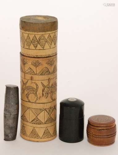 A 20th Century Burmese Mustur cylindrical bamboo container with tools for incising ripe poppy capsules, height 17cm, also a small steel double ended container, a small barrel shaped opium box and a similar ebony example (4)