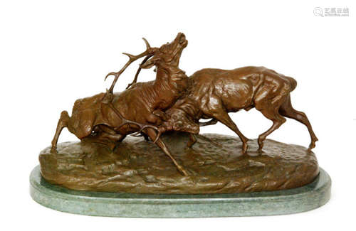 Lovis Edmond Masson (1838-1913) - A 19th Century bronze study of two rutting stags on a green oval marble base, signed, length 51cm, base 55cm