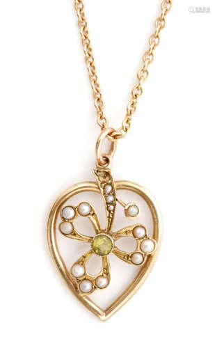 A 9ct seed pearl and peridot set pendant designed with a pearl set shamrock within a heart shaped frame central collar set peridot to fine belcher link chain, weight 5g stamped S/D