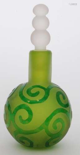 A Blowzone studio glass scent bottle of globe and shaft form cased and cut with scrolling motives in gloss green over the satin green ground all below a satin bobbin form stopper, engraved signature, height 16cm.