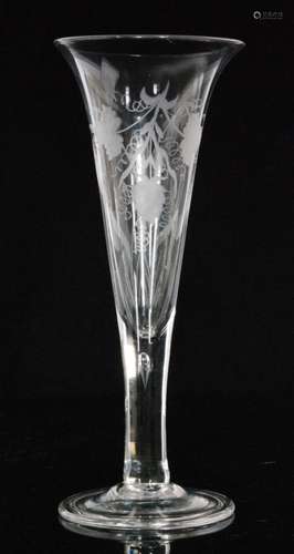 A 20th Century oversized ale glass in the 18th Century taste, trumpet bowl engraved with hops and barley above a teared plain stem and conical folded foot, height 30.5cm.