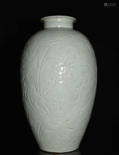 A Carved Celadon Vase