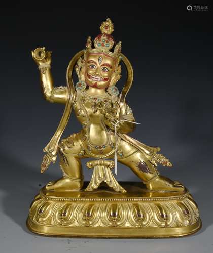 A Gilt Bronze Dharma Buddha Statue