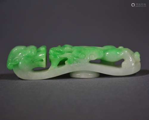 A Carved Jadeite Garment Hook with GIA