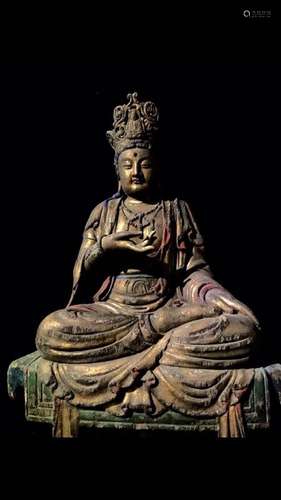 A Carved Wood Buddha Statue