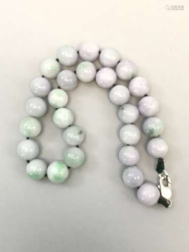 A Jadeite Necklace, 28 Beads