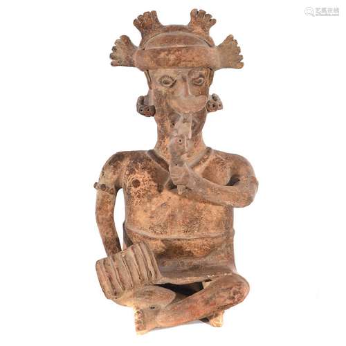 Pre-Columbian "Seated Figure with Effigy Whistle"