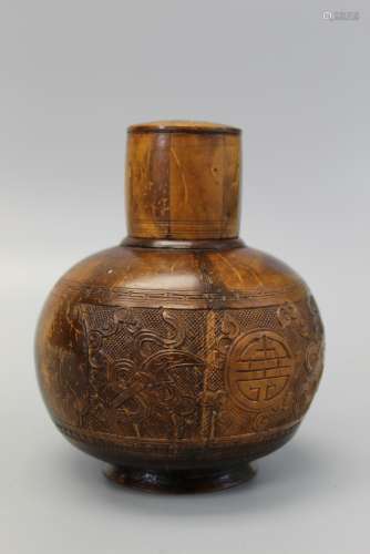 Chinese carved coconut shell tea caddy.