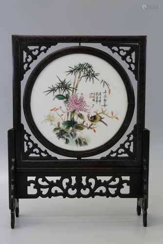 Chinese carved wood table screen with famille rose