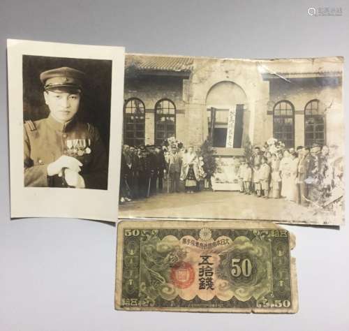 A BLACK AND WHITE PHOTO AND A BANK NOTE