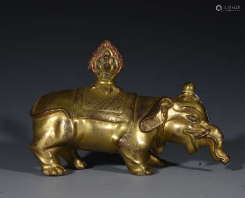 A GILT-BRONZE FIGURE OF ELEPHANT