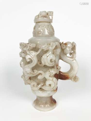 A JADE CARVED VASE AND COVER