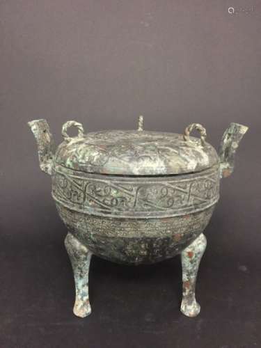 A BRONZE TRIPOD CENSER AND COVER