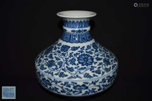 A BLUE AND WHITE ZUN VASE