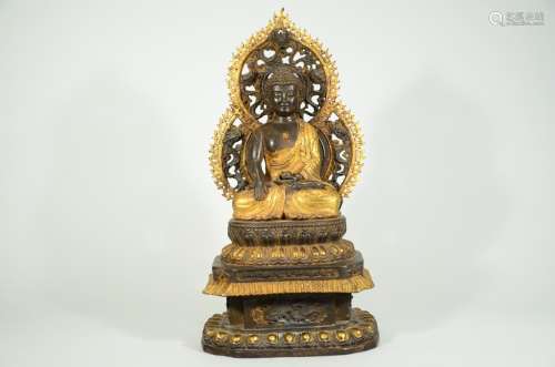 A PARCEL GILT-DECORATED BUDDHA  AND BASE
