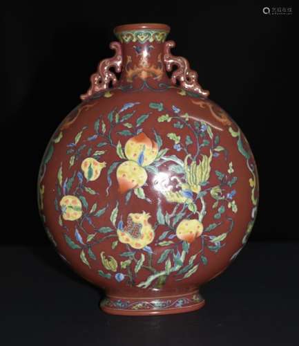 A RED-GROUND FAMILLE ROSE MOON FLASK VASE